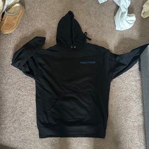 Harry’s house sweatshirt.